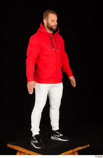 Dave black sneakers dressed red hoodie standing white pants whole…